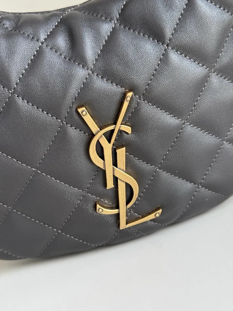 View 2 of Quilted Mini Bag with Gold Logo – Elegant Everyday Carry