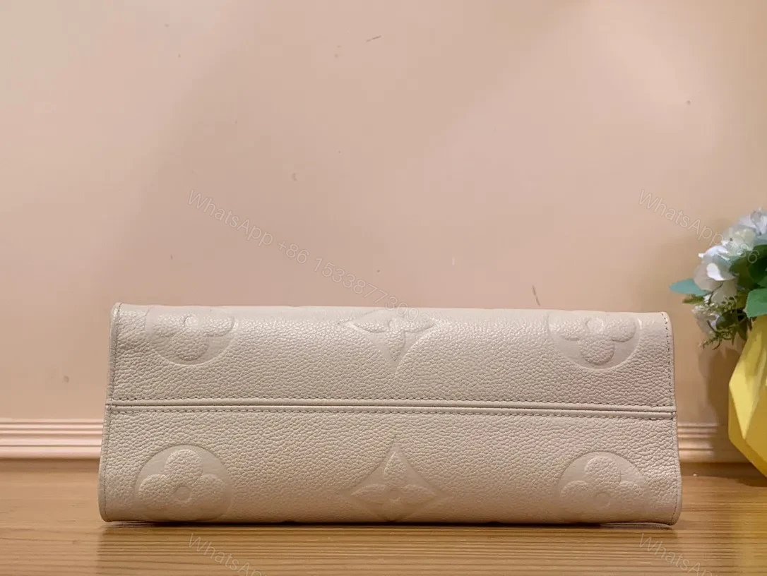 View 6 of Louis Vuitton LV On The Go Mini Replica 11 White Milk Handbags 25x13x10cm