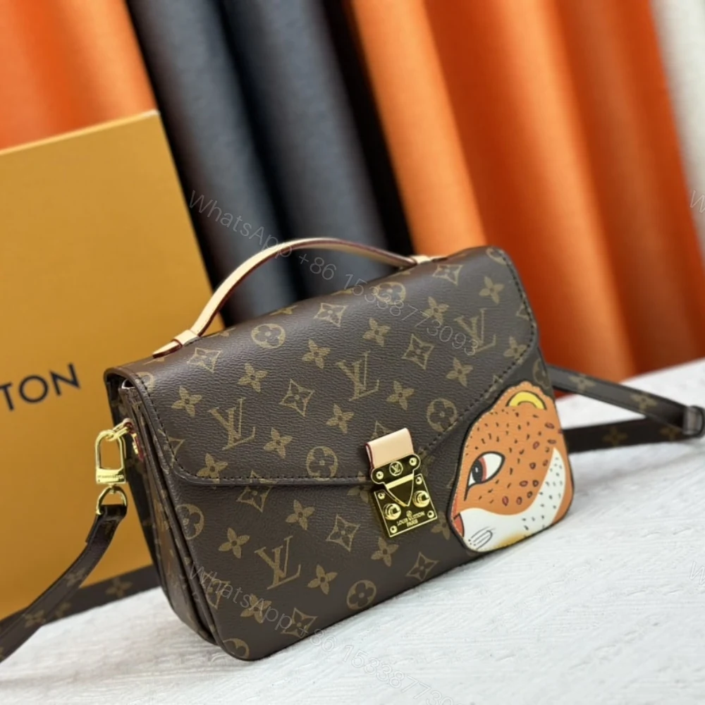 View 2 of Louis Vuitton Pochette Métis Monogram Coated Canvas 25Cm M47203