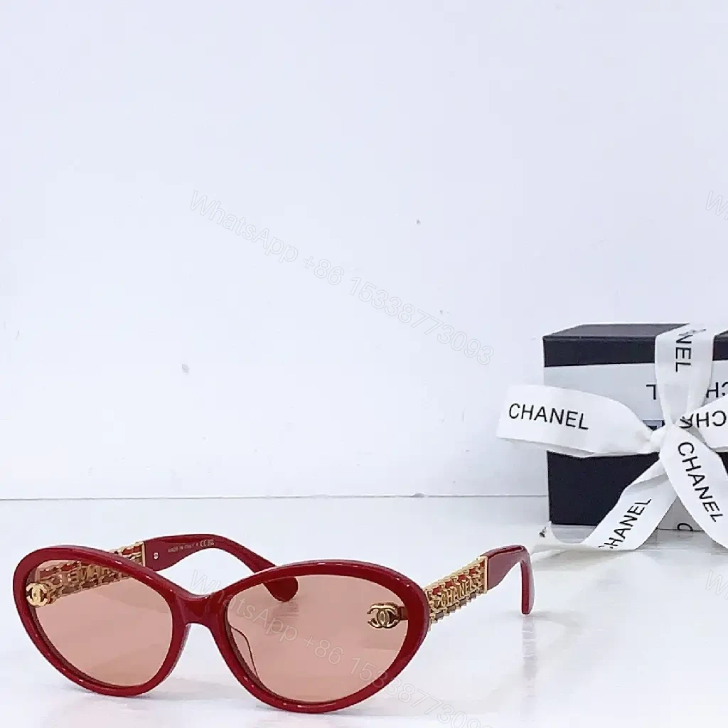 View 2 of Bold Red Cat-Eye Sunglasses with Gold Hardware Detailing