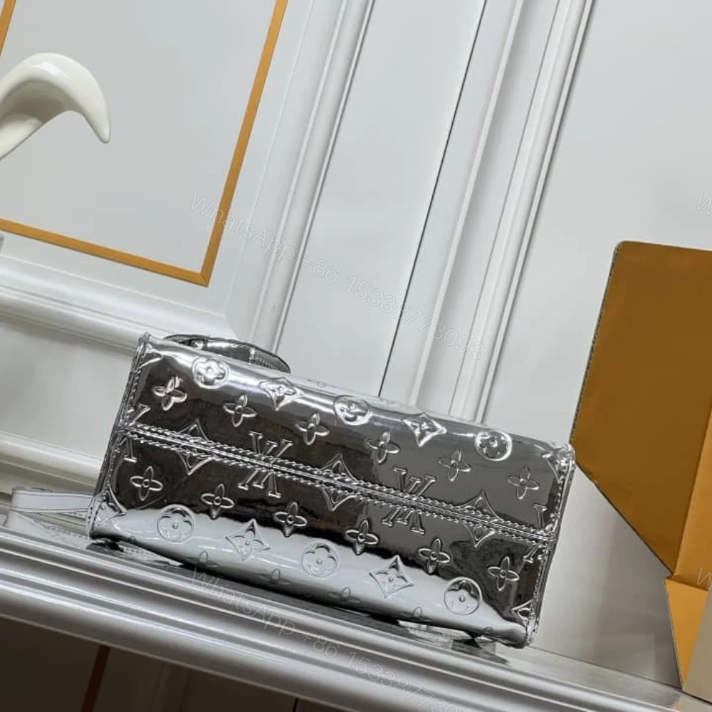 View 7 of Louis Vuitton Onthego PM Silver 25Cm M26373