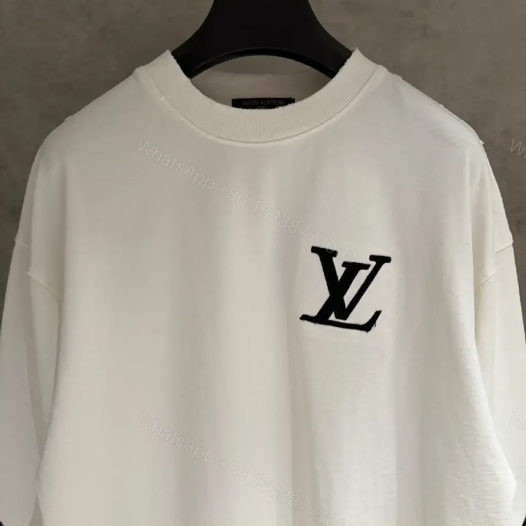 View 4 of White Cotton-Blend Pullover with LV Logo & Architectural Sleeves