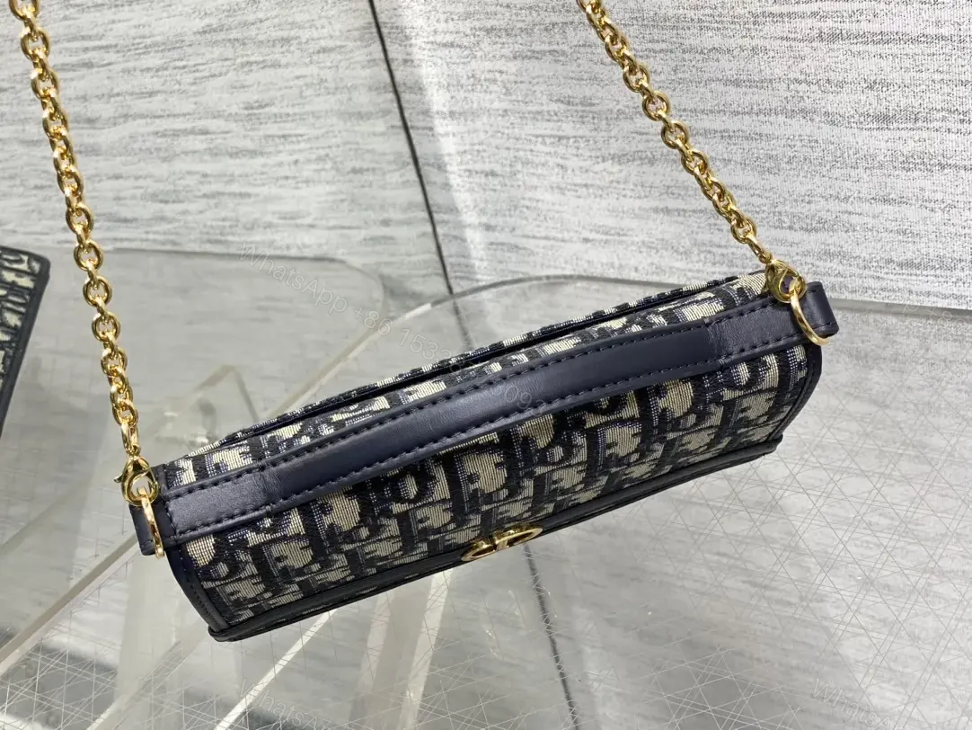View 7 of Navy monogram canvas leather-trim shoulder bag for everyday luxury