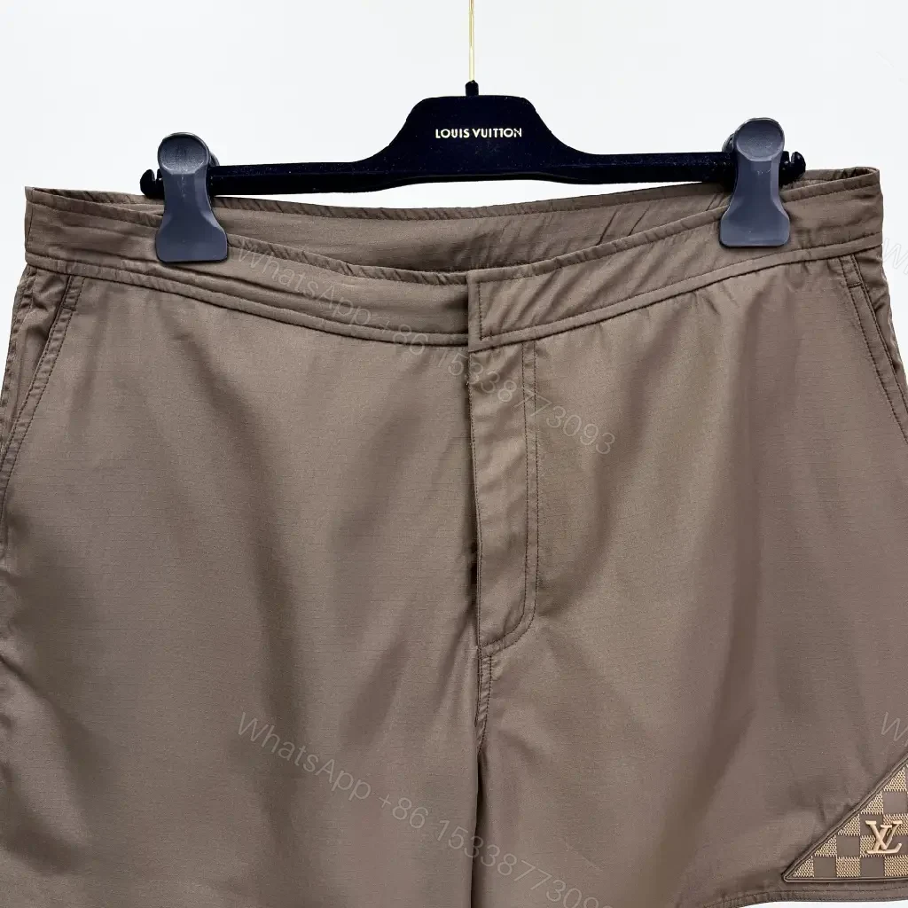 View 10 of Brown Nylon Casual Shorts Louis Vuitton Logo Patch Shorts