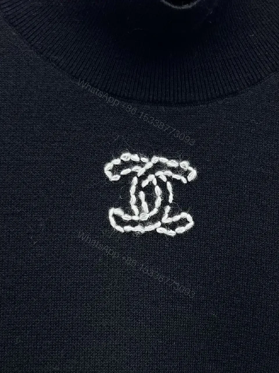 View 4 of Elegant Knit Turtleneck with Signature Embroidery, Black Knit Dishive
