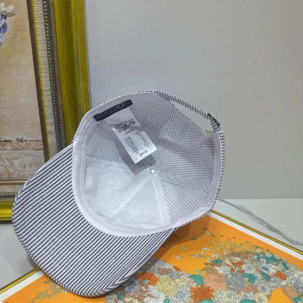 View 4 of Striped Linen-Look Cap with Subtle Monogram Motif
