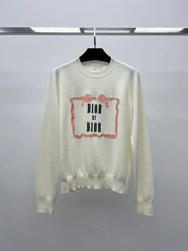 cream cotton knit sweater with pink framed monogram print luxury casualwear — view 1