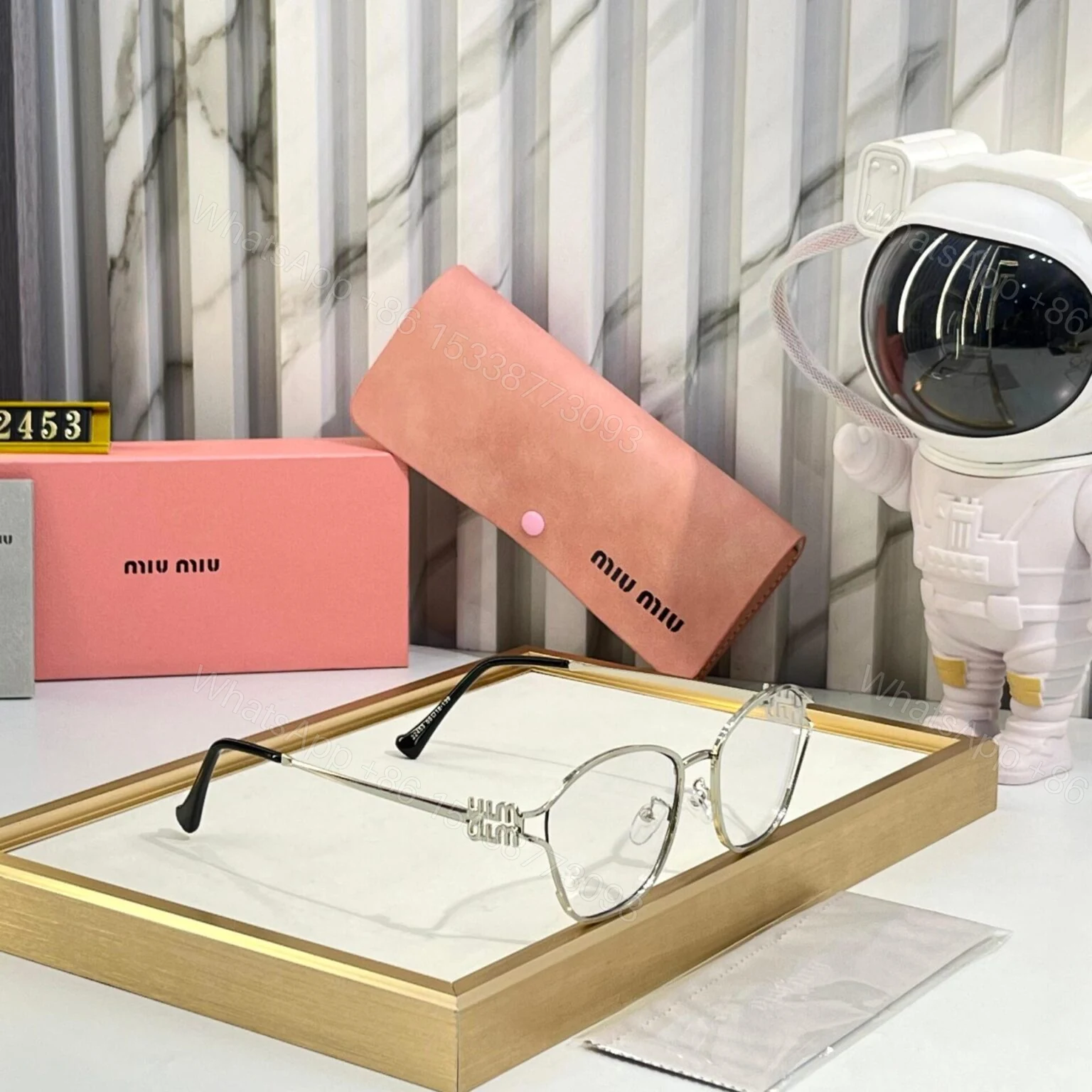 View 2 of MiuMiu Sunglasses Black Universal UV Protection
