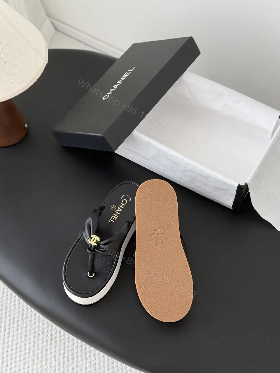 View 9 of Black Leather Slide Sandals with Gold Chanel Logo