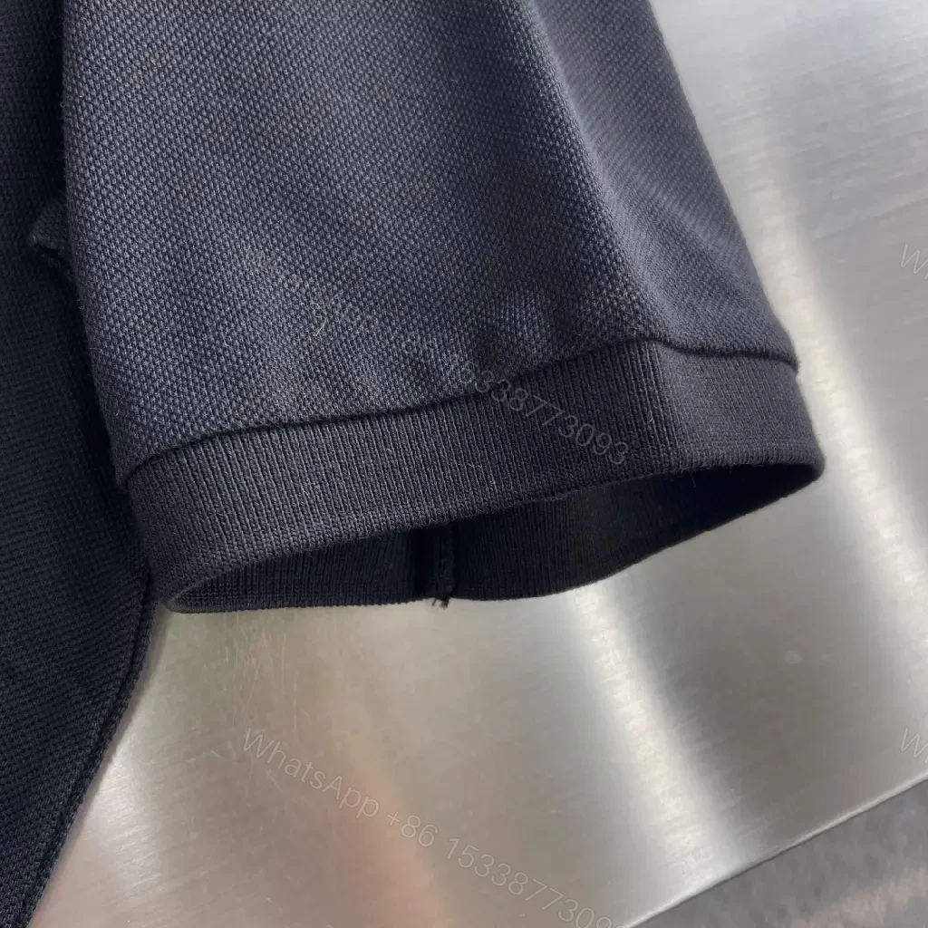 View 4 of Black Polo Tee with Green Clover – Subtle Luxe Everyday Polo