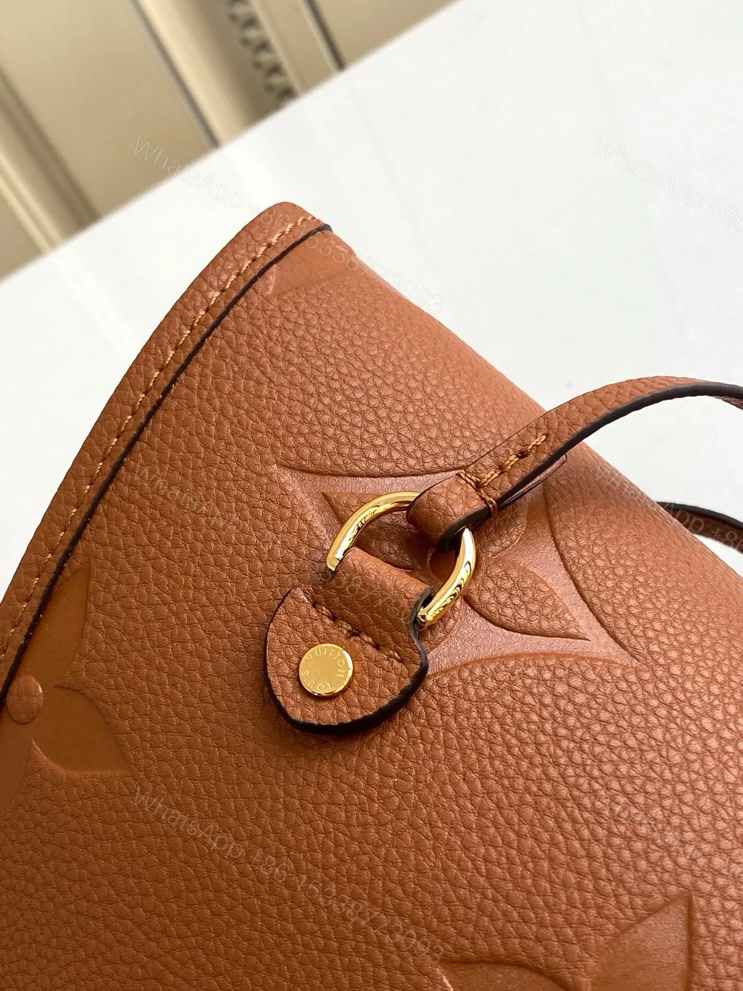 View 4 of LV NEVERFULL MM 32 BROWN MONOGRAM EMPREINTE LEATHER