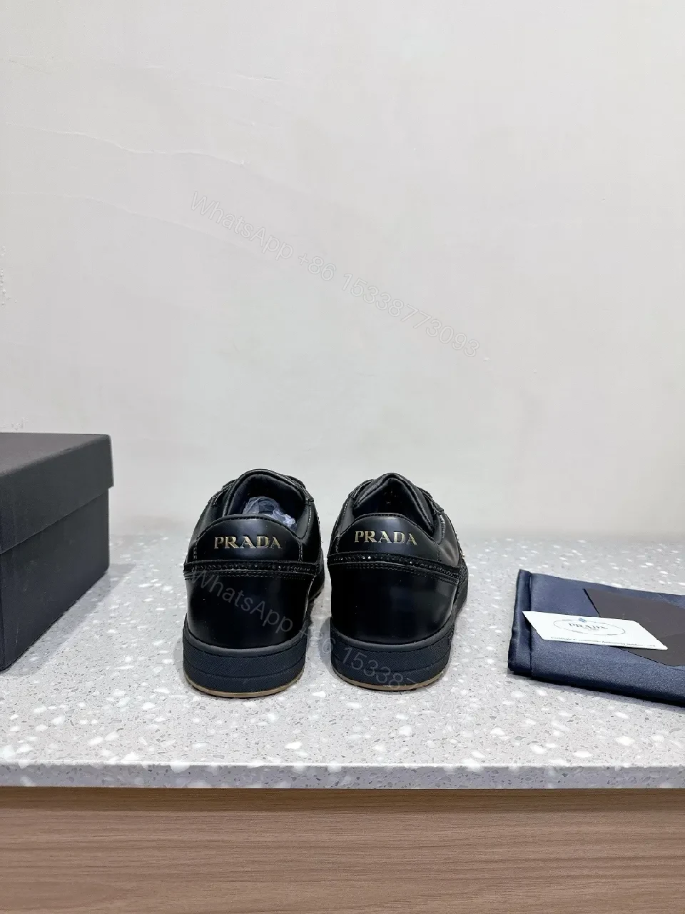 View 5 of Black Leather Grid-Textured Luxury Sneakers with All-Day Comfort