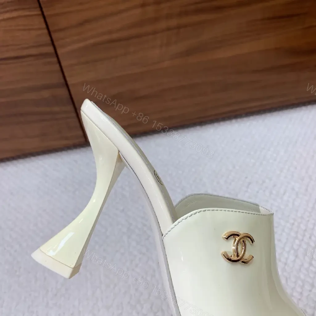 View 10 of Cream Leather Slide Sandals, Pearl White, Chanel Logo, Midsize Heel Mules