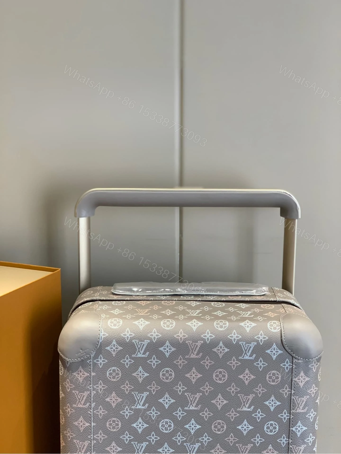View 8 of Louis Vuitton Horizon 55 Suitcase Mahina Perforated Calfskin Leather Gray 55Cm M10282