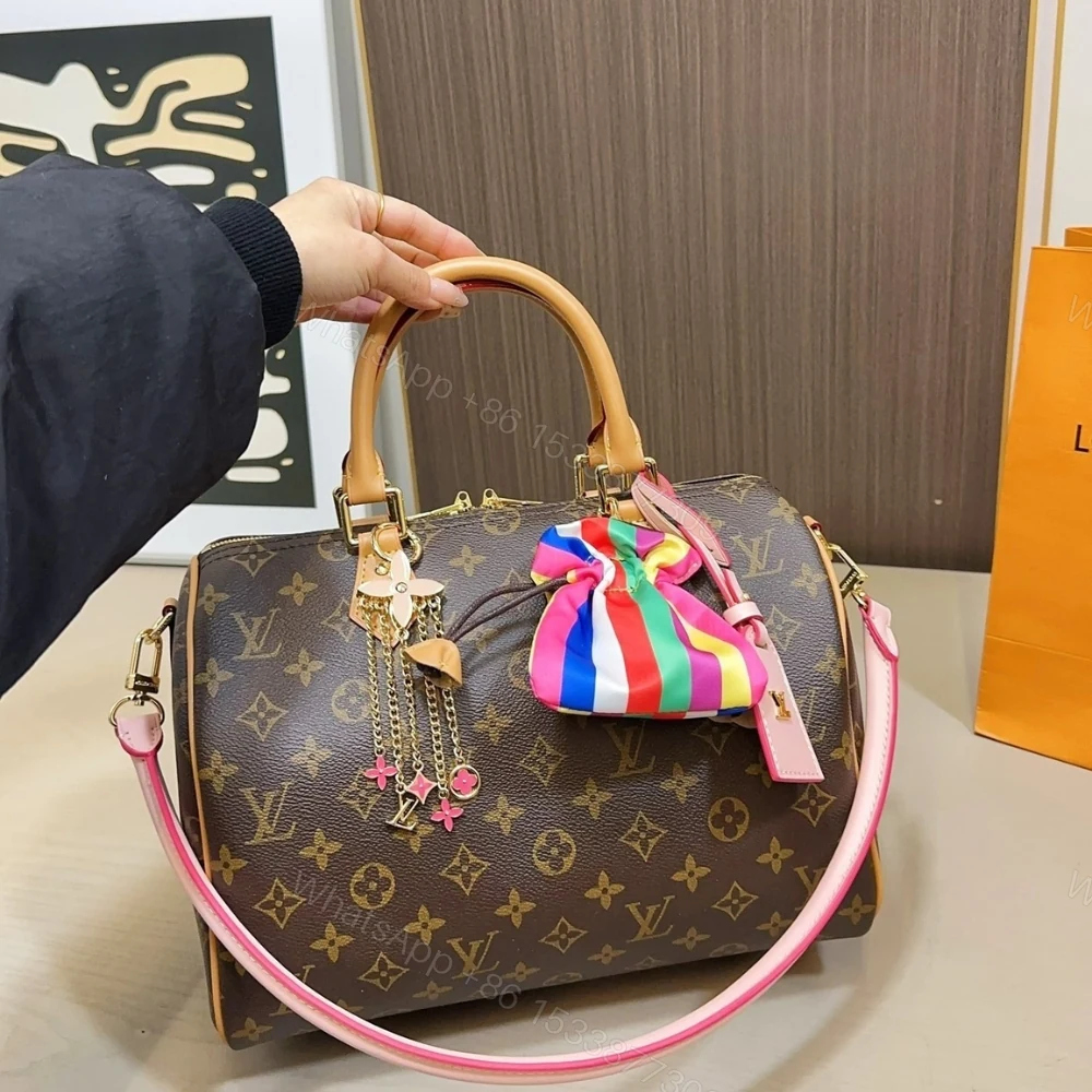 View 3 of Louis Vuitton Speedy Soft 30 Monogram Canvas Brown 30Cm M26498