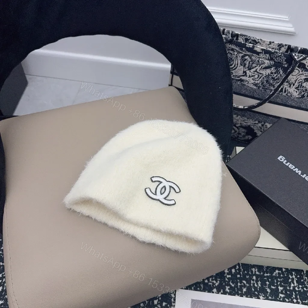 Ivory Plush Handwarmer: Luxe Logo-Embossed, Lightweight Warmth — view 1