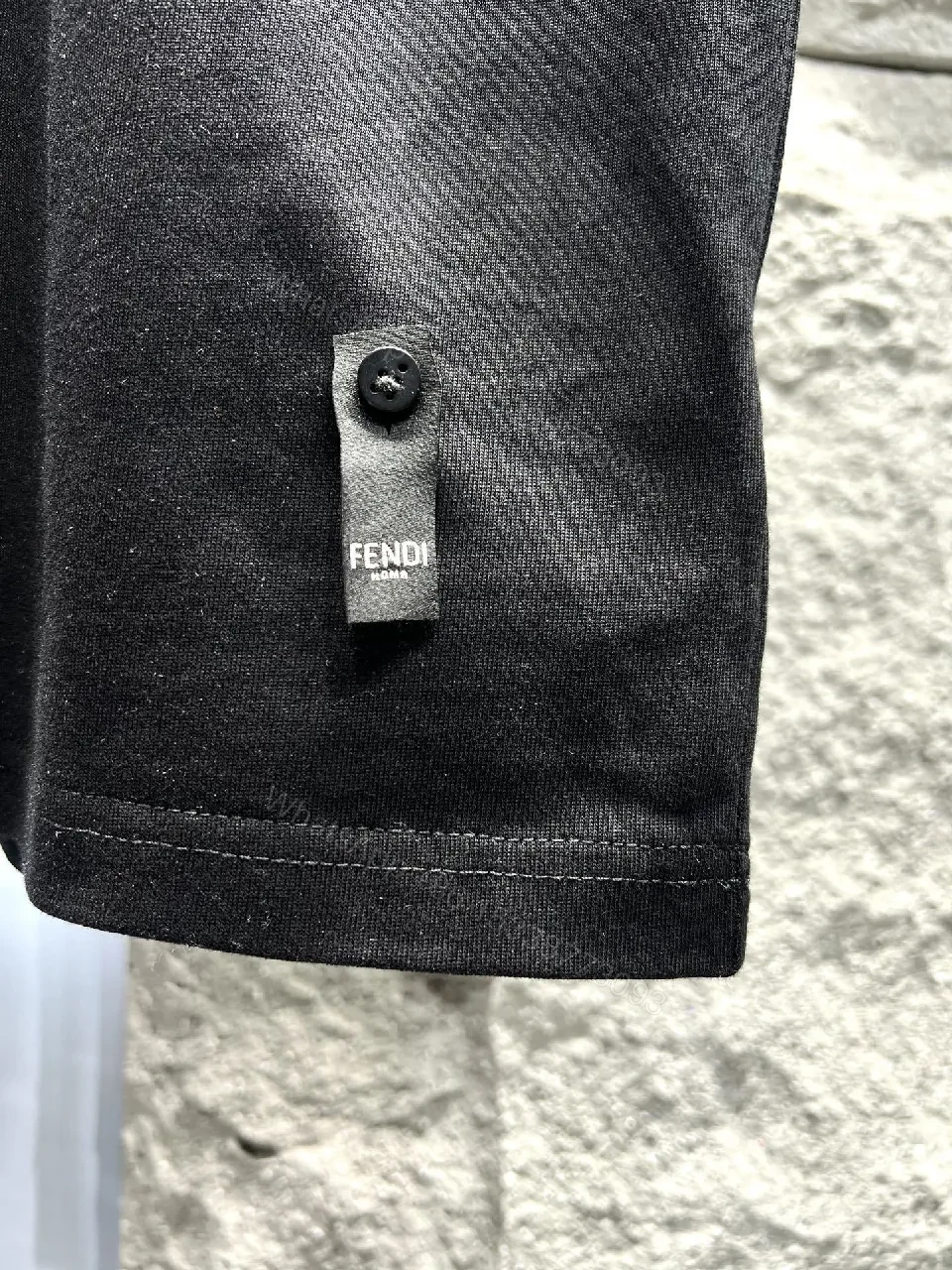 View 10 of Bold Black Tee with Red Fendi Logo Film-Glow