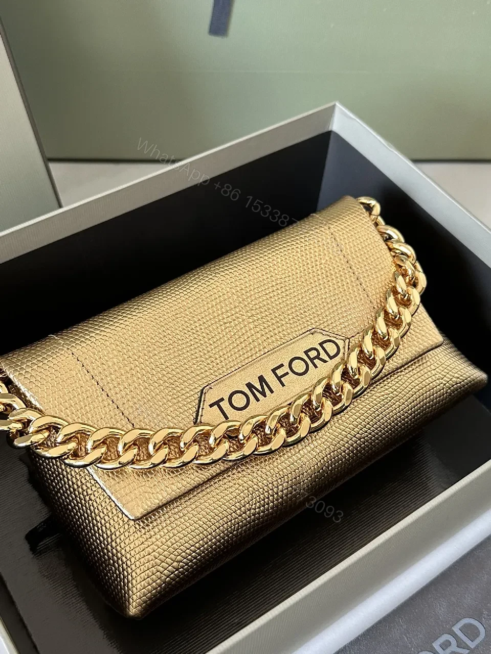 View 4 of Textured Leather Mini Bag with Bold Gold Chain Accent