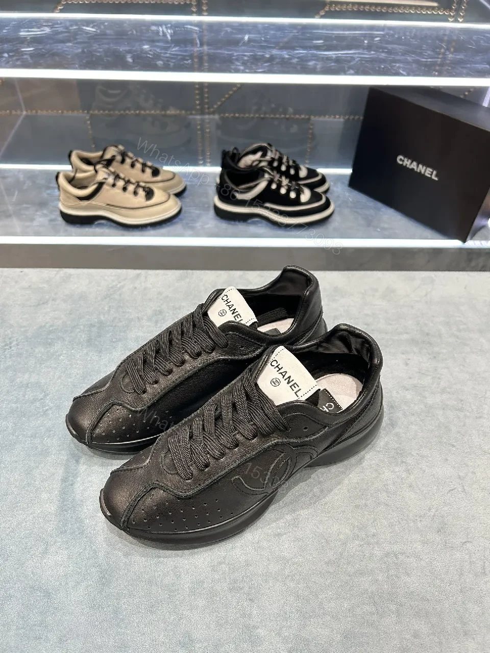 View 3 of Black Leather-Trim Sneaker with Perforations + Luxe Casual Sneakers
