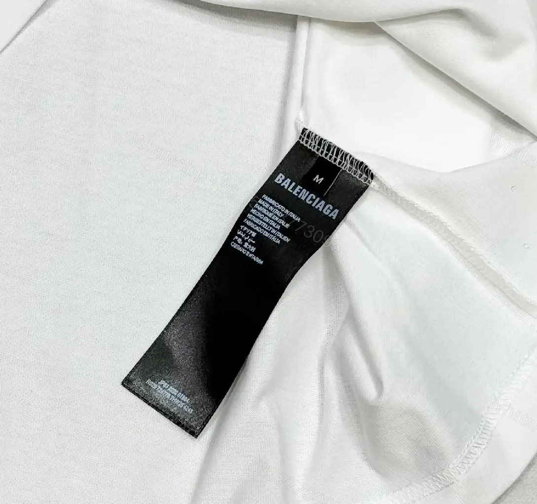 View 7 of Minimalist White Tee: Subtle Logo, Premium Cotton Short Sleeve Tee