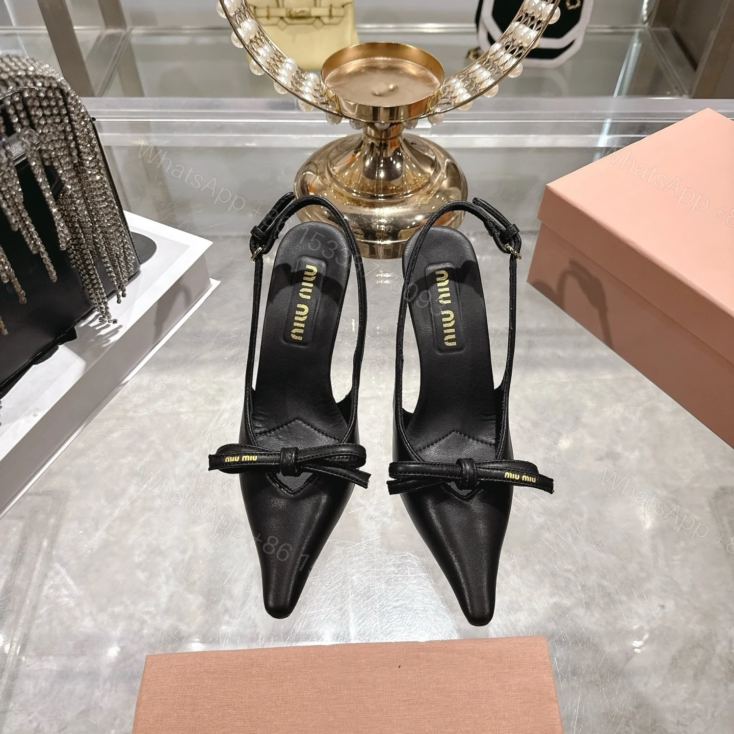 View 2 of Miu Miu Slingback Pumps With Bow Black