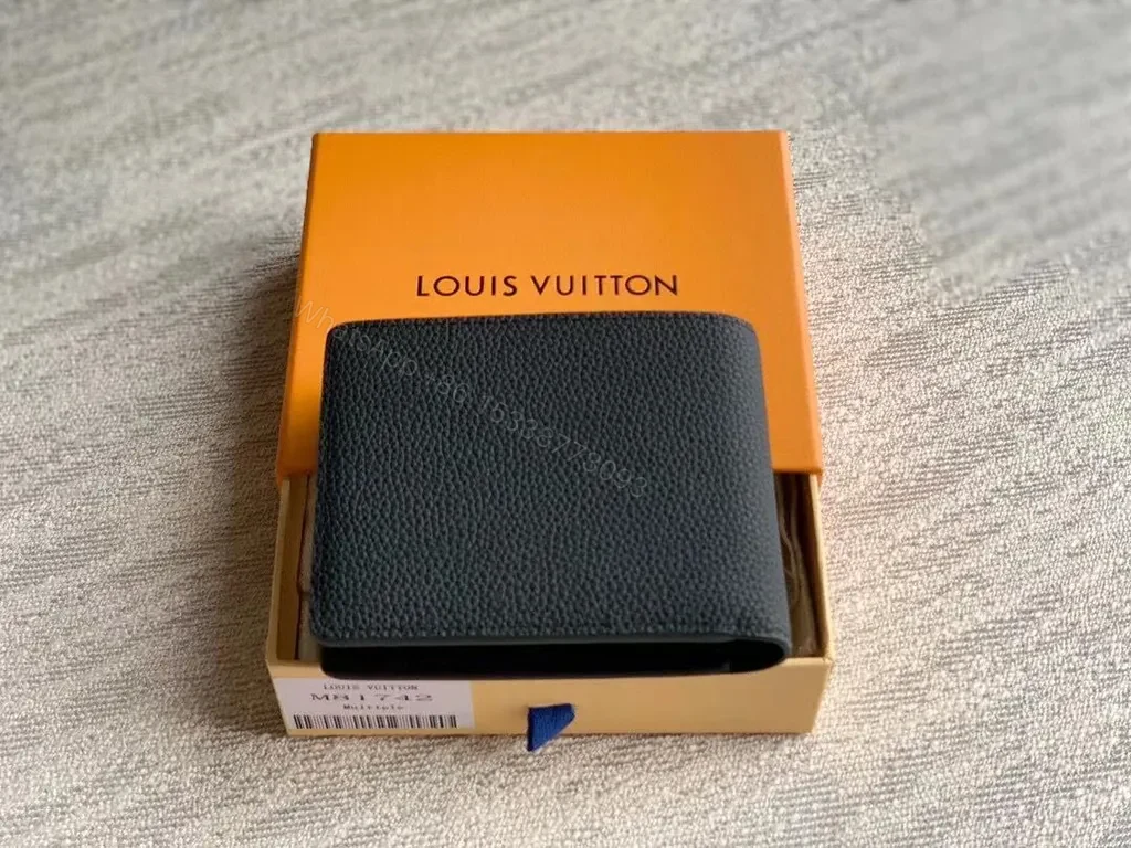 View 2 of Compact Black LV Pebble-Grain Wallet with Discreet Embossing
