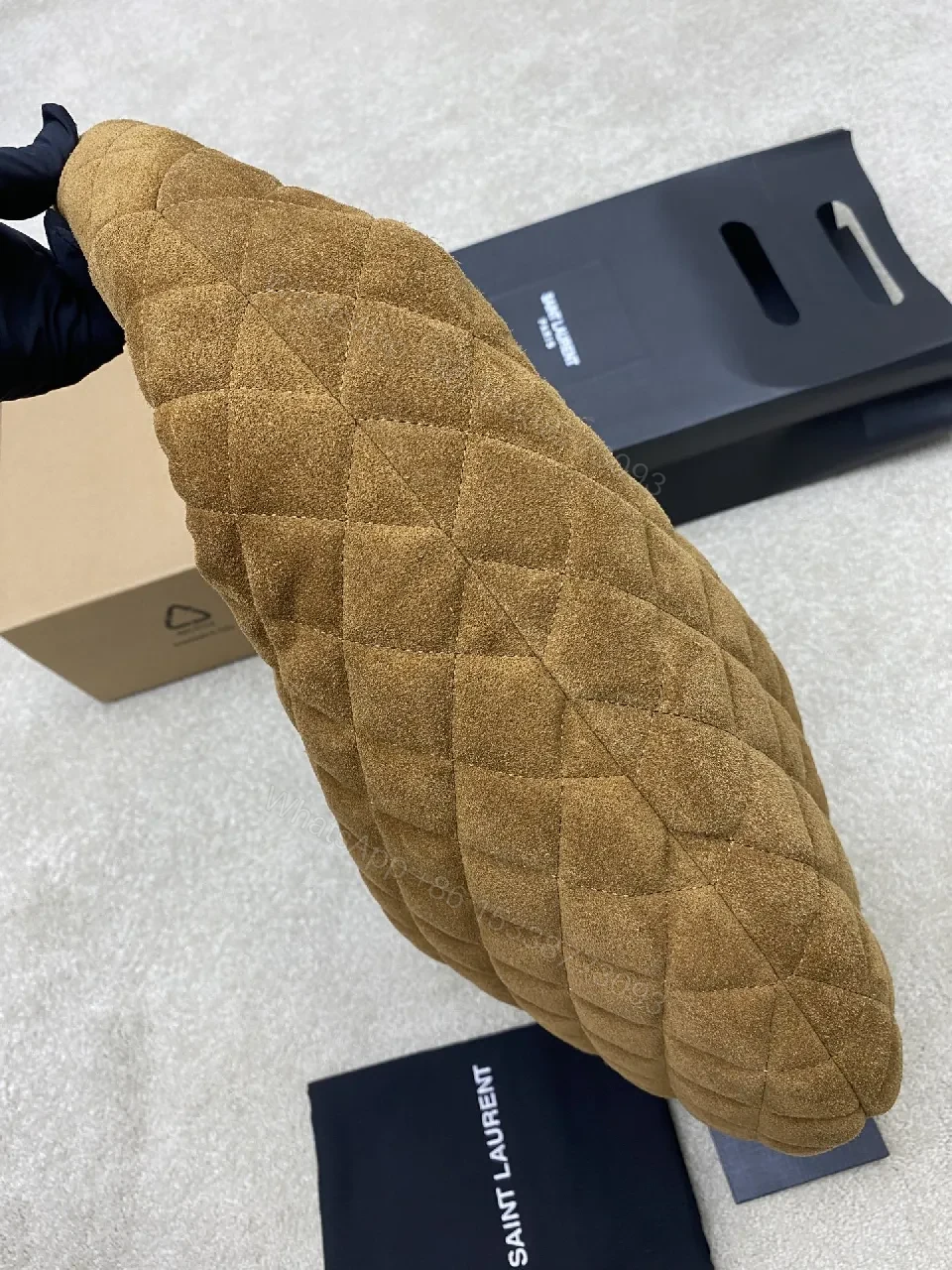View 7 of Taupe Quilted Circle Bag - Luxury Style, Plush Top-Handle, Iconic Hardware