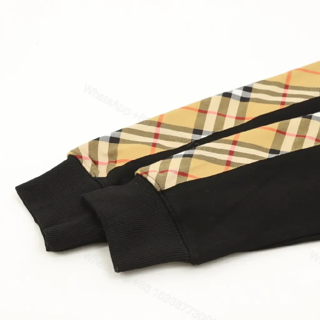 View 5 of Black Knit Crewneck with Signature Check Sleeves, Slim Fit, Luxury Casual