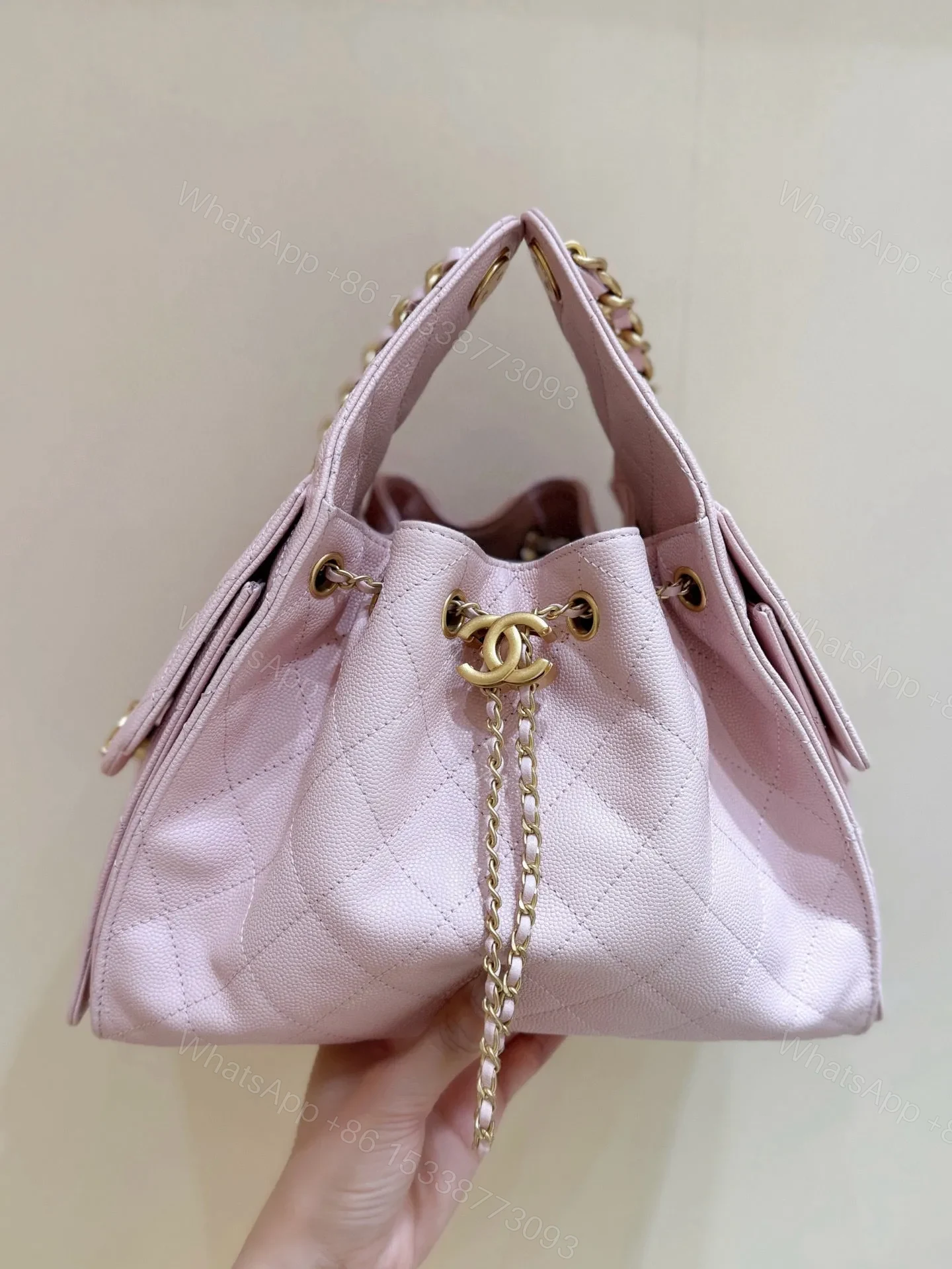 View 4 of CHANEL 25 HANDBAG IN PASTEL PINK WITH GOLD HARDWARE