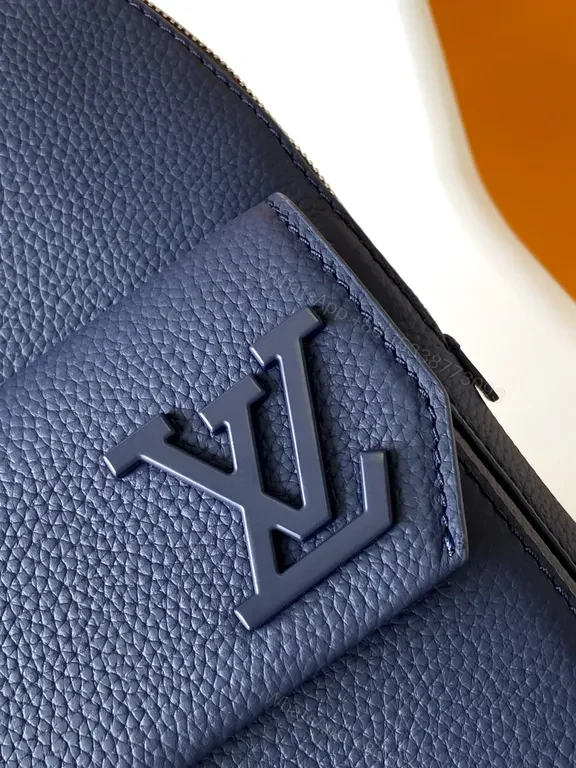 View 9 of Chic Blue Leather Compact Backpack with LV Detail