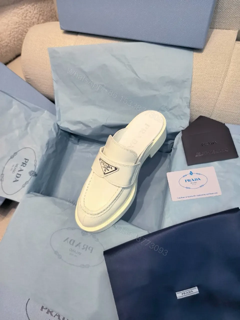 View 4 of White Leather Prada Slip-ons: Classic Padded Comfort Shoes
