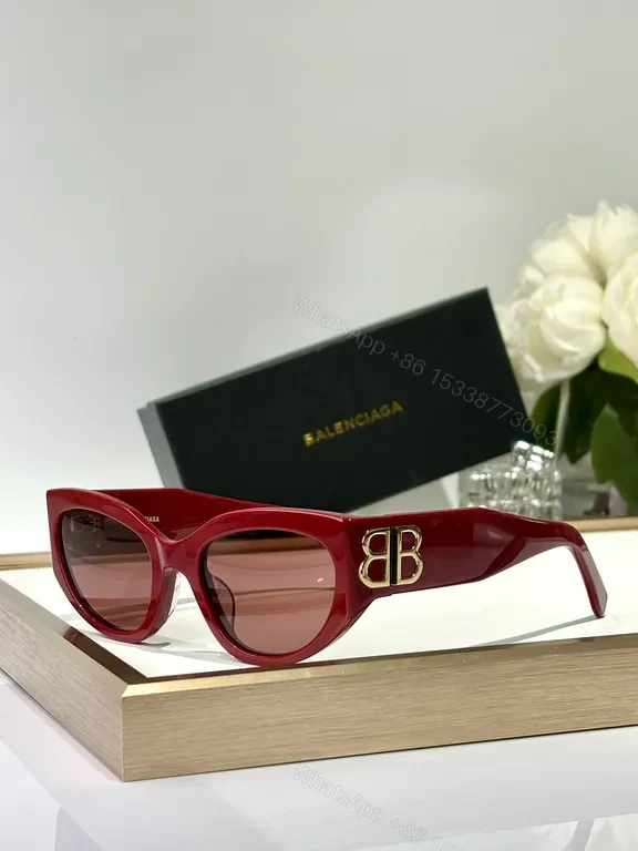 View 9 of Bold Black Frames with Gold BB Emblem Sunglasses