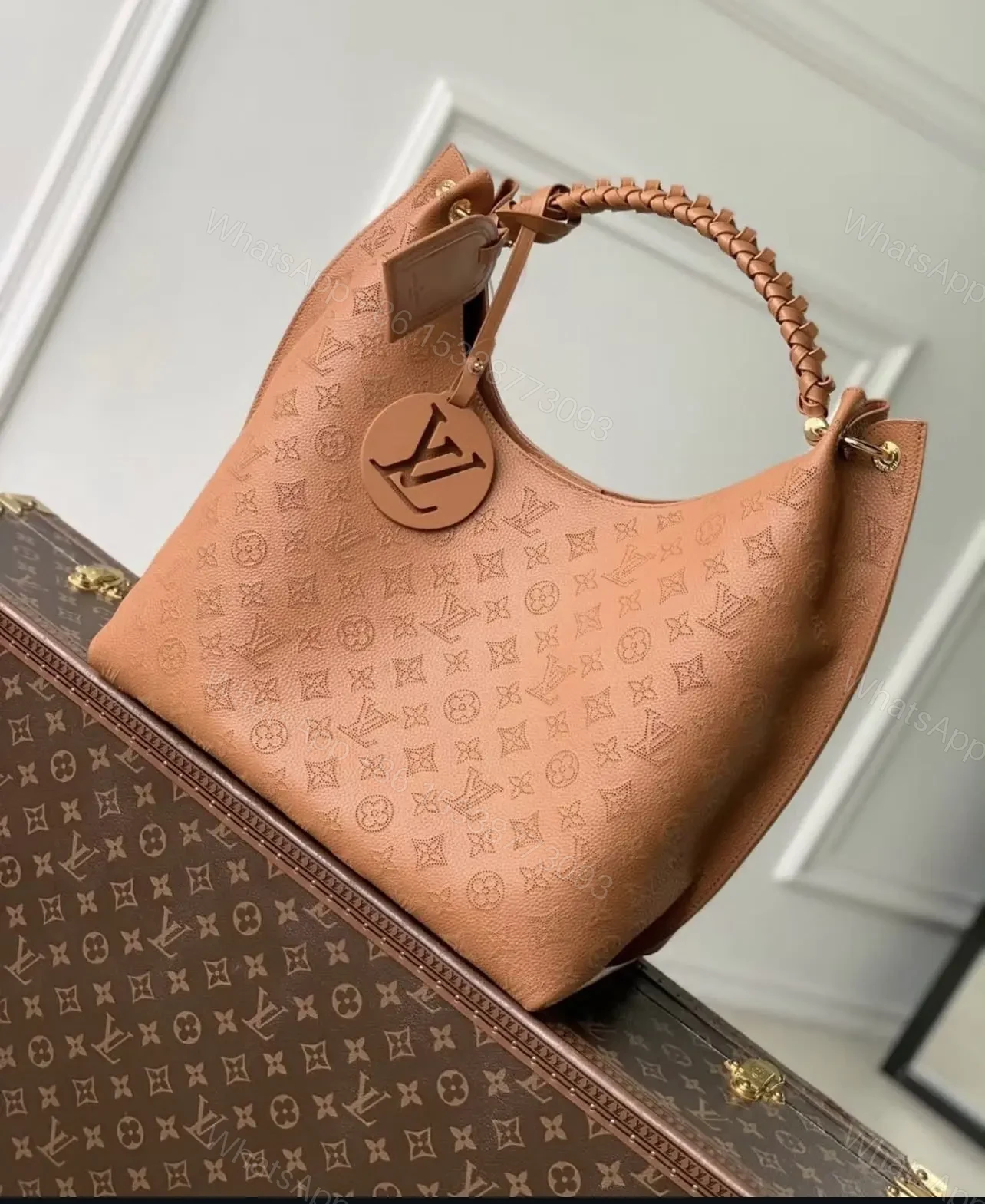 Louis Vuitton Carmel Mahina Leather Hobo Bag in Cognac — view 1