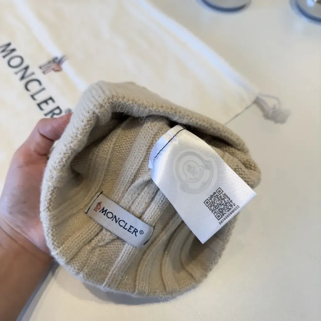 View 4 of Beige Ribbed Knit Beanie – Luxury, Signature Patch, Everyday Style