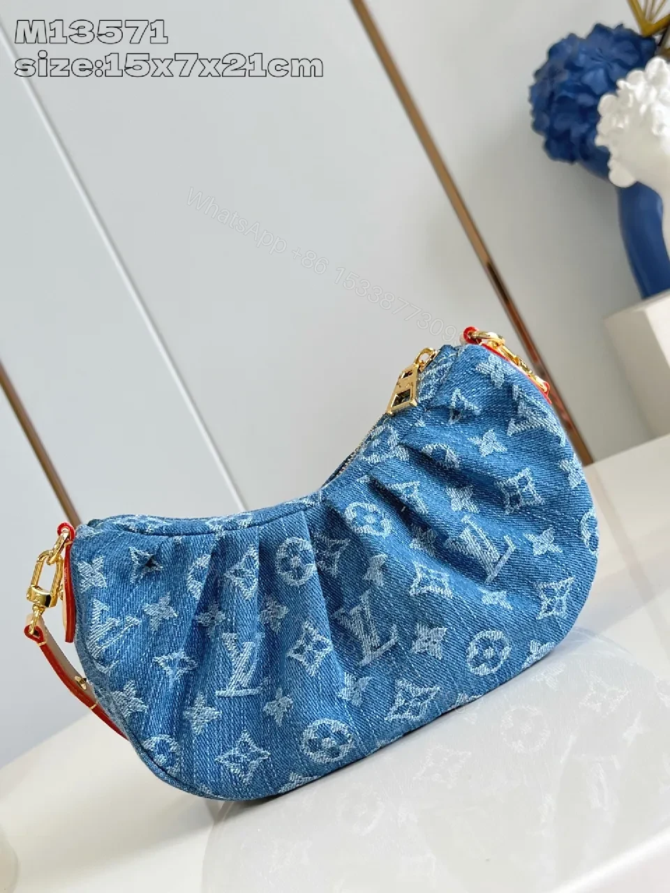 View 5 of Denim Monogram Crescent Bag: Modern, Durable, Luxury Accessory