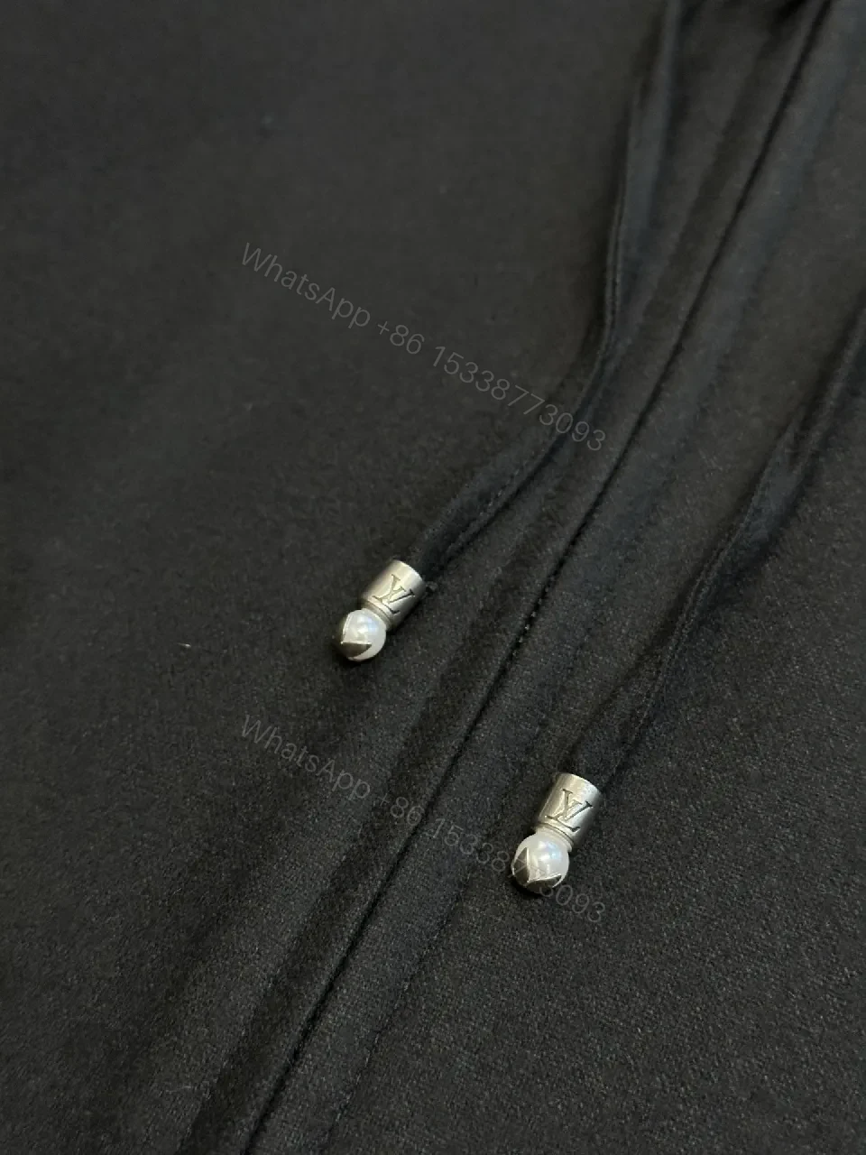 View 6 of Black Leatherette Minimal Zip Hoodie with LV Emblem