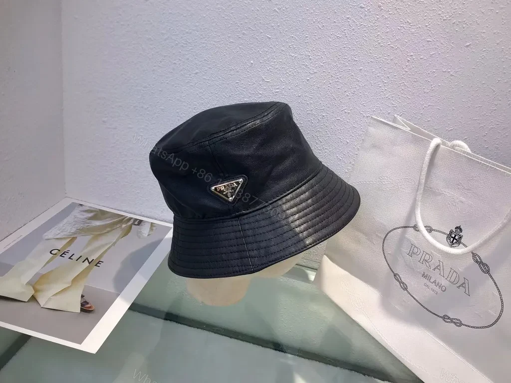 View 7 of Black Leather-Texture Bucket Hat with Prada-Inspired Logo