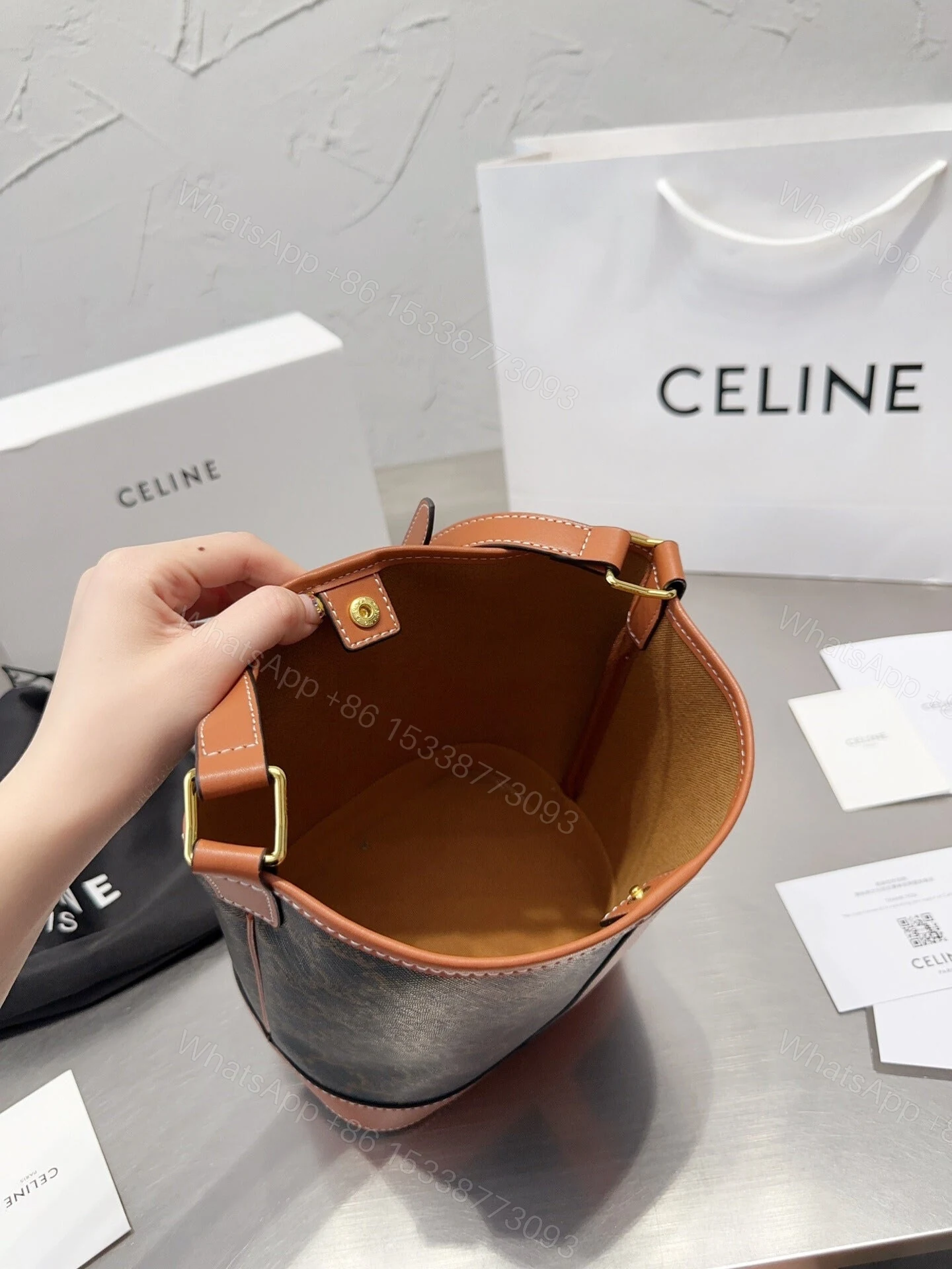 View 3 of CELINE SMALL BUCKET IN TRIOMPHE CANVAS AND CALFSKIN TAN 20CM 191442CAS04LU