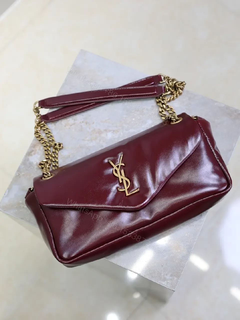View 4 of Burgundy Calfskin Compact Shoulder Bag with Gold Hardware