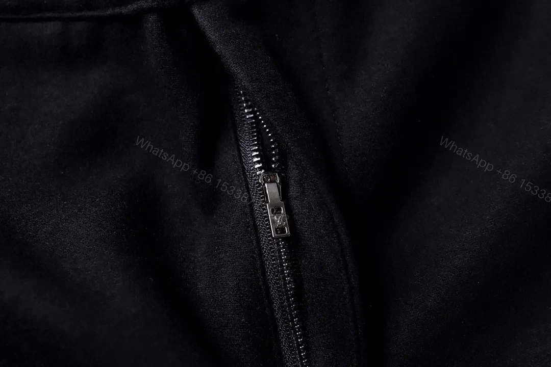 View 8 of Chic Black Wide-Leg Track Pants with Subtle Monogram Monstère