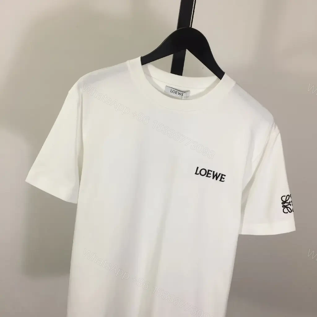View 6 of Minimalist White Tee with Signature Accents—Premium Cotton-jersey Tee