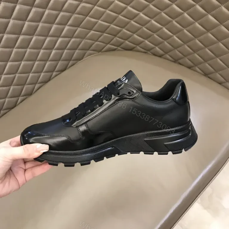 View 8 of Prada Black Leather Patent-Panel Sneakers, Discreet Luxury