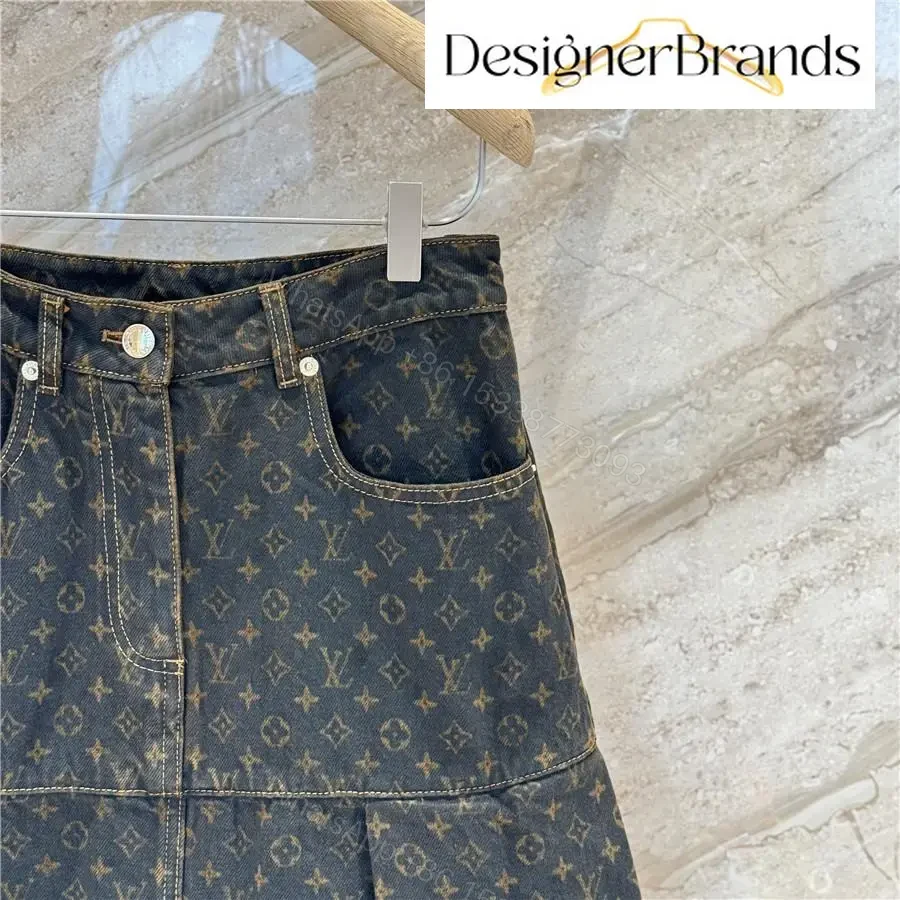 View 4 of Monogram-Denim A-Line Skirt with Visible Hardware