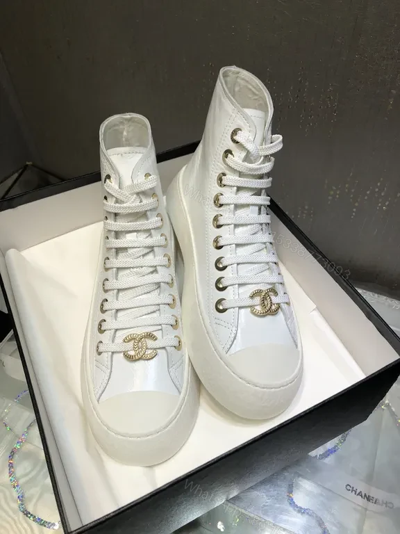 View 3 of Premium White High-Top Sneakers with Gold Emblem