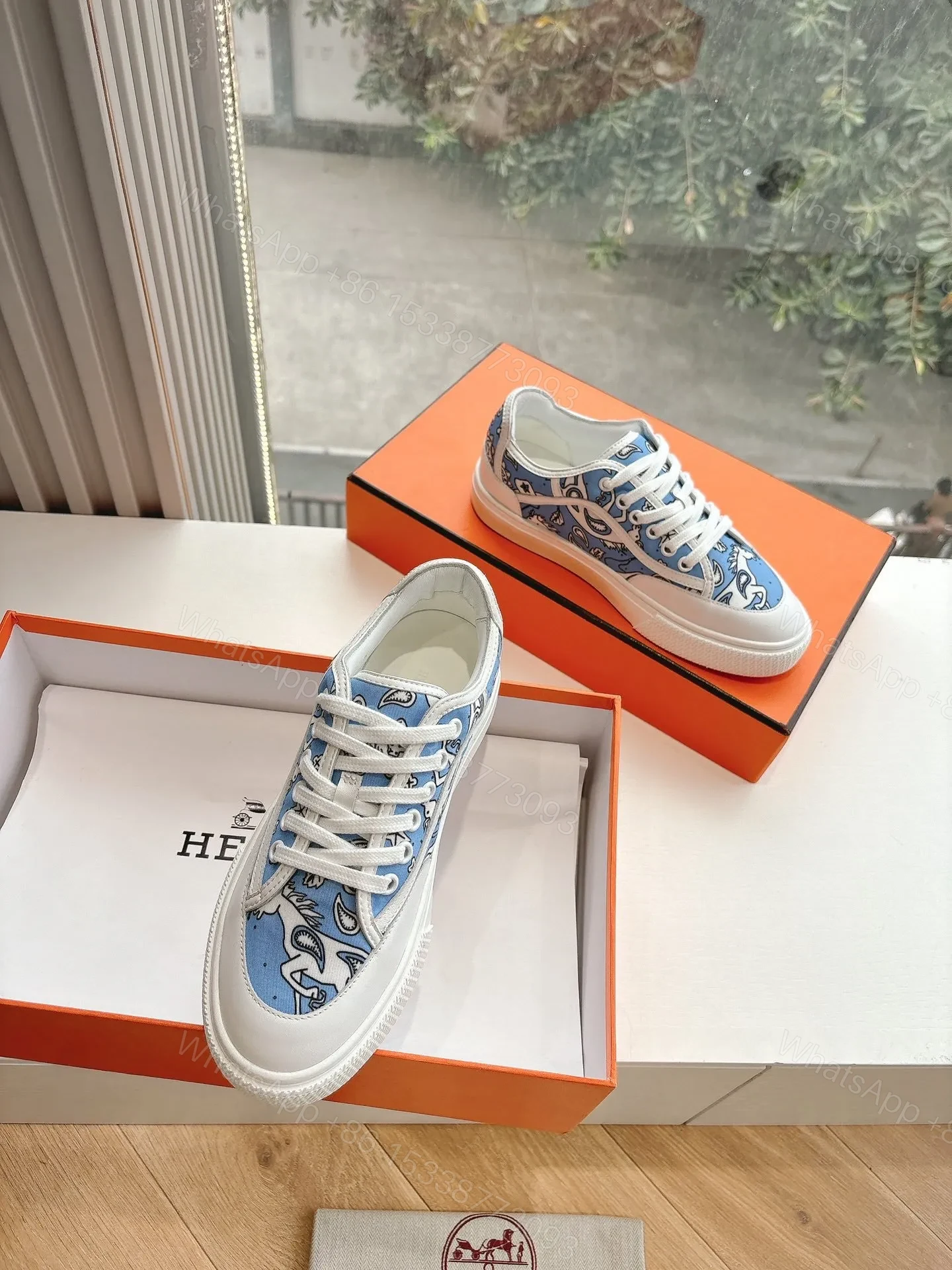 View 3 of Hermes Women Light Blue Canvas And White Sneakers