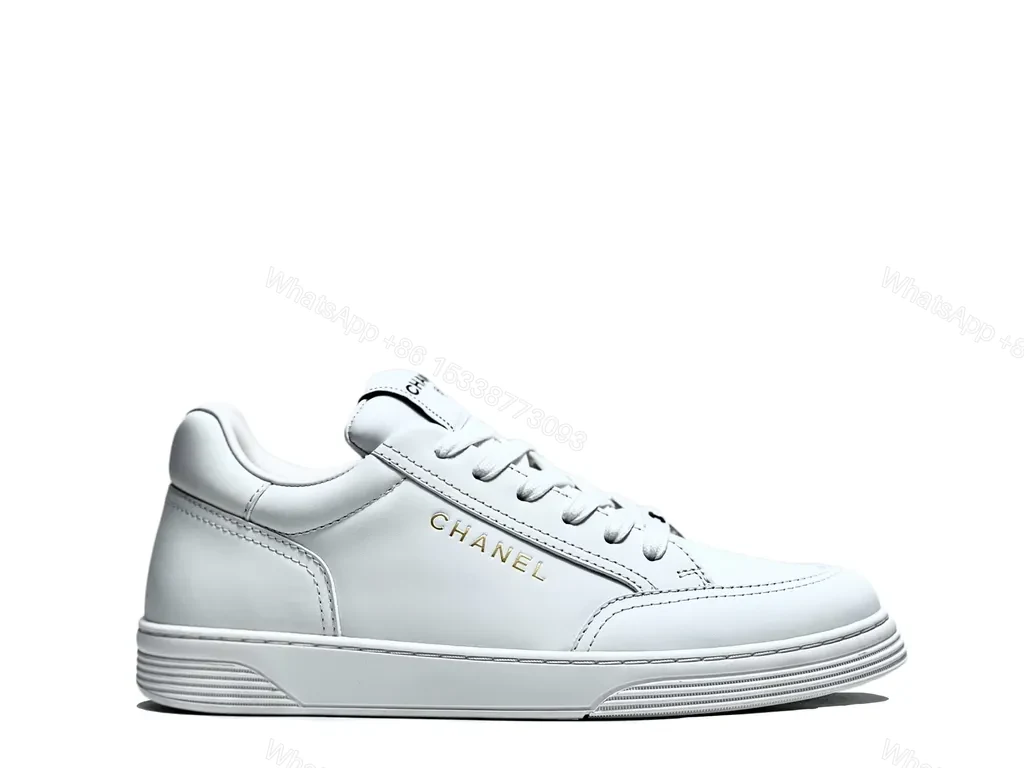 View 2 of White Leather Sneaker with Gold Detailing â€” Modern Luxury Casual Sneaker