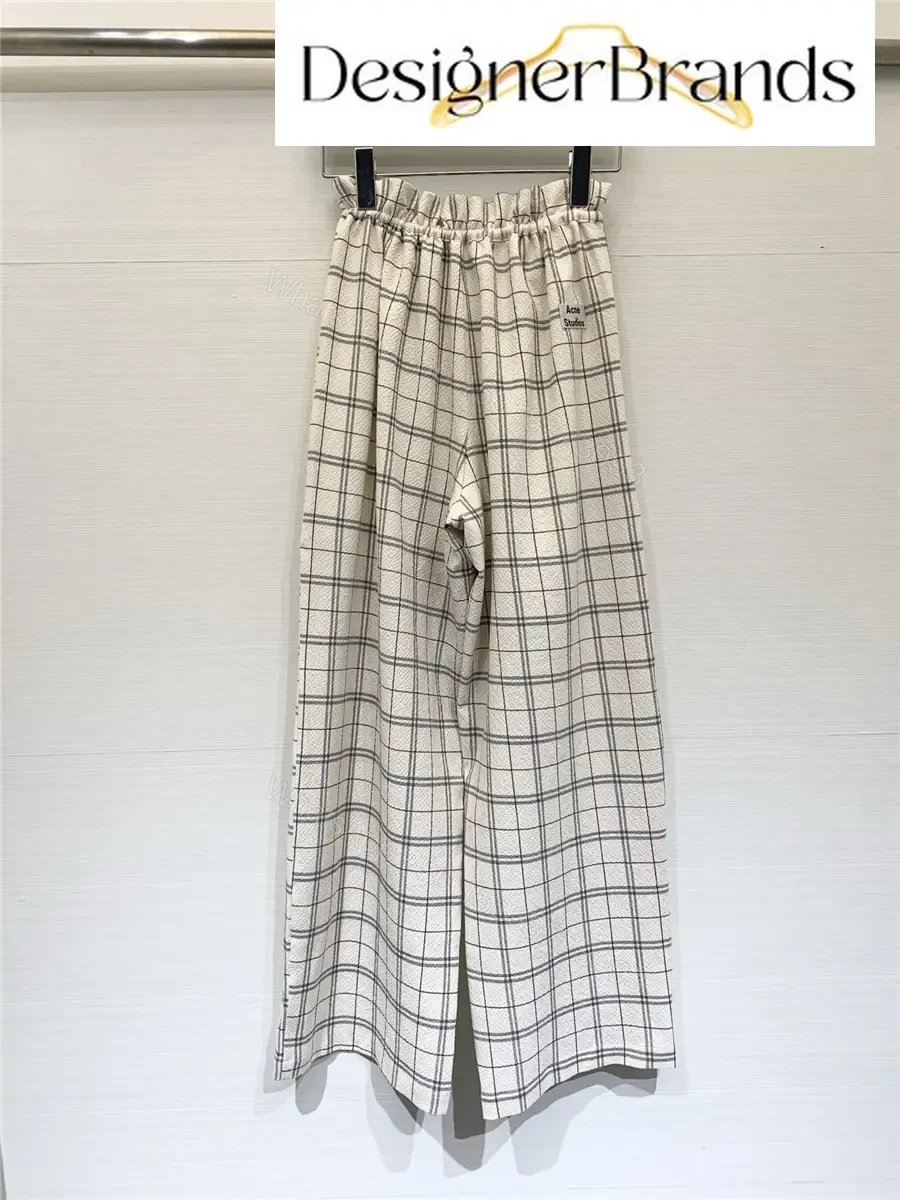 View 2 of Acne Studios Off-White Drawstring High-Waisted Wide-Leg Trousers