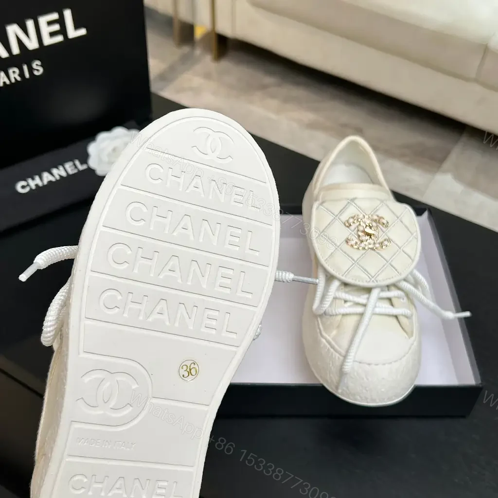 View 7 of Quilted Leather Slip-On Sneakers with Crest Embroidery