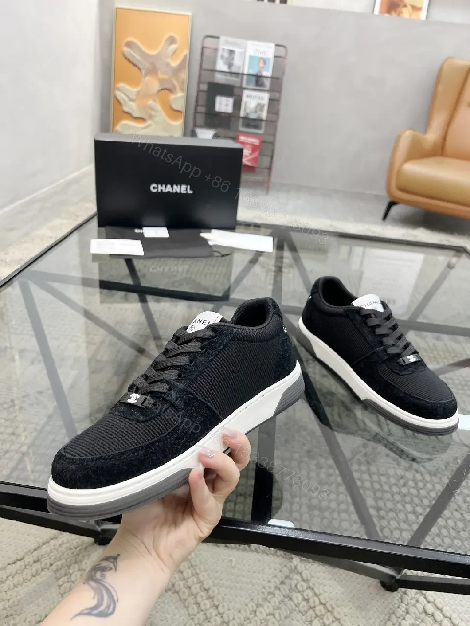 View 2 of Black Knit Sneaker + Leather-Texture Overlay + Minimalist + Signature Logo + Sneaker