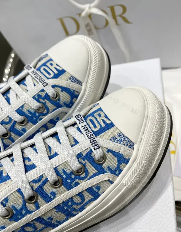 View 9 of Blue Canvas Sneakers with Dior Monogram Logo - Modern Luxe Footwear